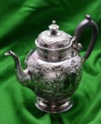 A highly decorative silver coffee pot by Edward & Sons, Glasgow. Hallmarked Glasgow 1894. With