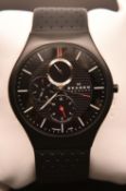 A Skagen 806XLTBLB Titanium watch with quartz movement. In black with three additional dials. With