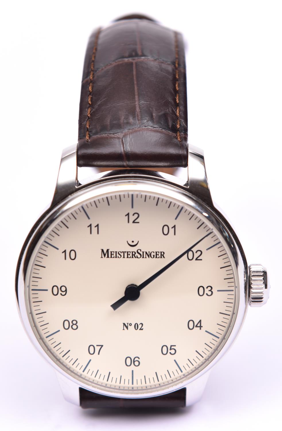 A MeisterSinger No.2 watch with manual winding movement. Stainless steel case, a cream face with