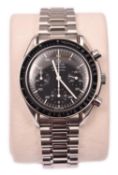 An Omega Speedmaster Chronograph watch with automatic self winding mechanism. With stainless steel