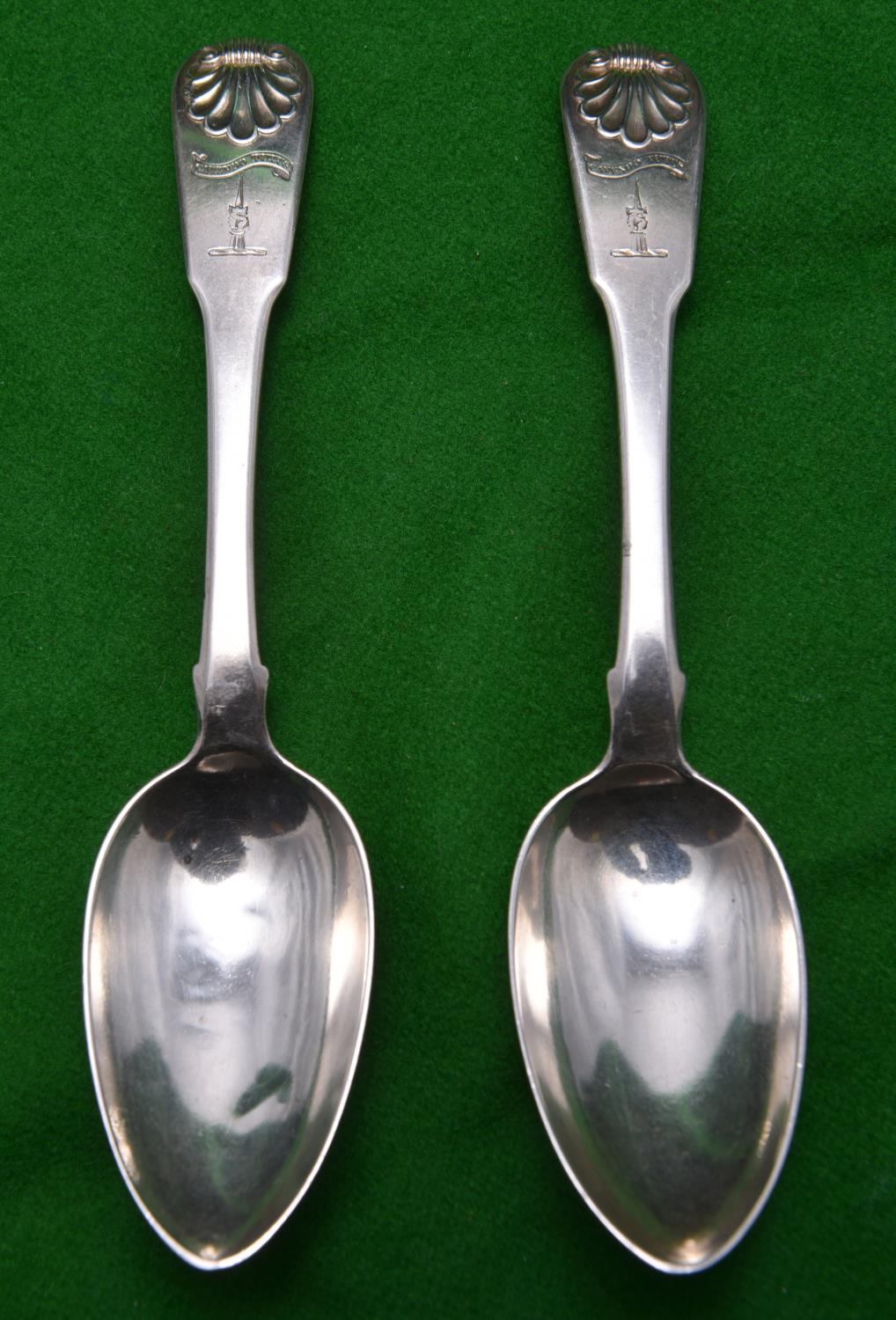 2x matching Georgian Scottish dessert spoons with scalloped decoration to handles and engraved crest