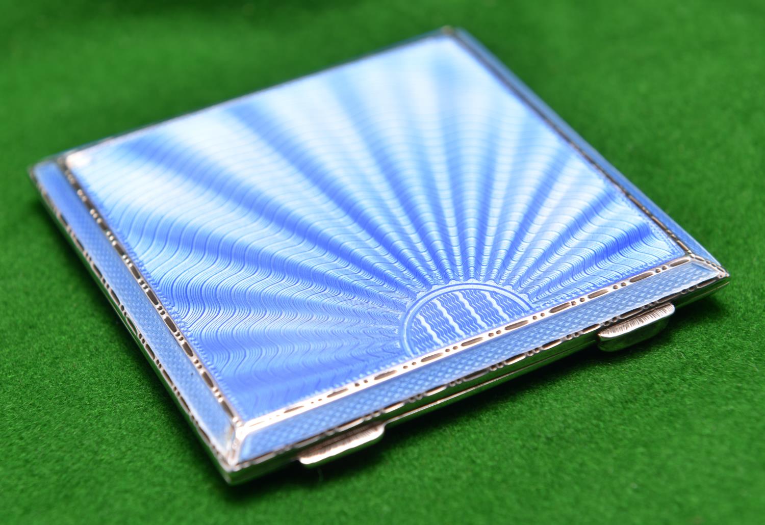 A silver powder compact with engine turned case, blue guilloché enamel lid and fitted mirror inside. - Image 2 of 3