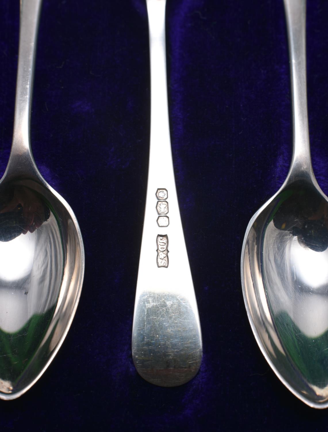 A cased set of 6 silver teaspoons of plain design. Hallmarked Sheffield 1920, 'J.D&S'. Combined 55g. - Image 2 of 2