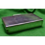 A silver sandwich box of plain design. Double hinged box with carrying handle. Hallmarked
