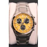 An Accurist MB882Y JS00 Chronograph watch with quartz movement. Metallic yellow face with three