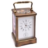 A modern L'Epee, France brass carriage clock. A repeater clock with separate alarm dial below main