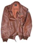 A modern copy of a US Army Air Force type A2 mid brown leather flying jacket, with printed U.S.A.A.F
