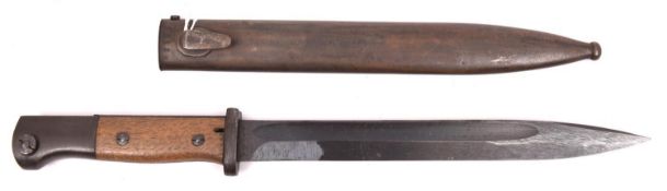 A good Third Reich Mauser bayonet, 9¾” blued blade marked “OLC 44 F2817”, wood grips, in its