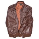 A modern copy of a US Army Air Force type A2 dark brown leather flying jacket, with “Sefton Clo. Co”