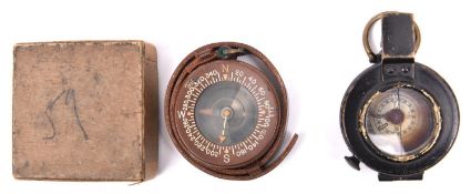 A WWII liquid filled prismatic marching compass, by T.G. Co Ltd, London”, number B119478, marked “