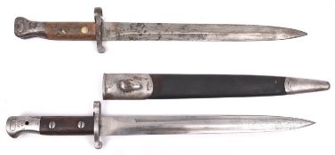 A scarce 1903 pattern SMLE bayonet, 12" blade marked “03” (other markings indistinct), wood grips,