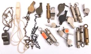 21 various whistles, mostly WWII military: 3 Air Ministry marked dinghy whistles; 8 “Metropolitan”