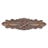 A Third Reich Close Combat clasp, bronze 15 day finish, marked on reverse “FEC W.E. PEEKHAUS BERLIN”