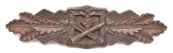 A Third Reich Close Combat clasp, bronze 15 day finish, marked on reverse “FEC W.E. PEEKHAUS BERLIN”