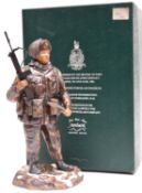 An Ashmor hand painted Fine Bone China figure representing a Falklands War soldier of the 1st Bn 7th