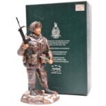 An Ashmor hand painted Fine Bone China figure representing a Falklands War soldier of the 1st Bn 7th