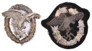 A Third Reich Luftwaffe Observer’s badge, silvered finish; also a cloth version with silver alloy