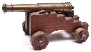 A good late 18th century bronze signal cannon, barrel 16" of classic form, bore approximately 7/