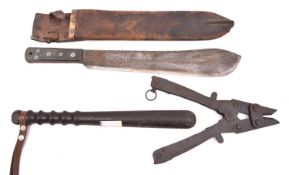 A pair of WWII wire cutters; a machete dated 1944 in its leather sheath; a hardwood truncheon marked