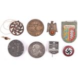 A Third Reich NSDAP badge, and 7 Lapel day badges. GC (8) £45-60