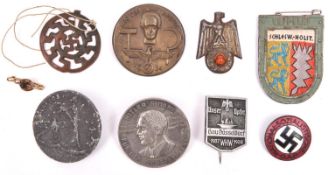 A Third Reich NSDAP badge, and 7 Lapel day badges. GC (8) £45-60