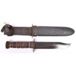 A WWII US Navy Mk 2 fighting knife, by RCC (Robertson Cutlery Co), with blackened blade, in its