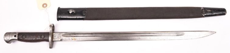 A 1907 pattern SMLE bayonet, issue marks for May 1918, blade 17" with crown and “WILKINSON”,