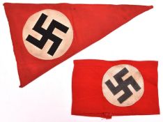 A Third Reich NSDAP Pennant, 14" x 8½”, applique central panel; also a man’s NSDAP arm band. GC (