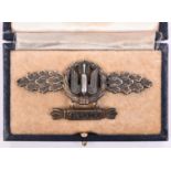 A Third Reich Luftwaffe Kampfflieger clasp in gold, gilt and silvered finish, “1300” tablet. In case