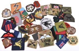 Approximately 180 modern military cloth badges, mostly British and a few American, including subdued