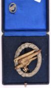 A Third Reich Army Parachutist’s badge, gilt eagle WM wreath, with a tiepin, in issue case. GC £