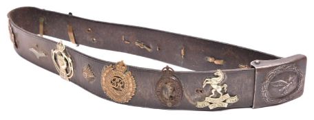 A Third Reich Luftwaffe leather belt, with grey steel buckle, the leather flap stamped “H. AURICH