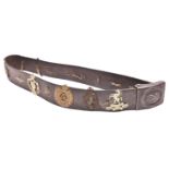 A Third Reich Luftwaffe leather belt, with grey steel buckle, the leather flap stamped “H. AURICH