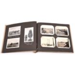 A Third Reich Naval photograph album, the inside of the cover bearing date stamp “18 Marz 1944”,