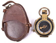 A WWI prismatic marching compass by “F-L”, number 125996, bearing broad arrow and date “1918”, the