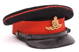 A Royal Artillery officer’s post 1902 blue peaked cap, with gilt (VGC) cap badge, regimental buttons