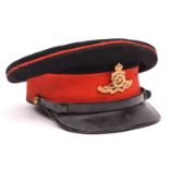 A Royal Artillery officer’s post 1902 blue peaked cap, with gilt (VGC) cap badge, regimental buttons