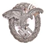 A Third Reich Luftwaffe Observer’s badge, of late war quality in matt grey zinc, with round wire