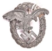 A Third Reich Luftwaffe Observer’s badge, of late war quality in matt grey zinc, with round wire