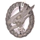 A Third Reich Luftwaffe Paratrooper’s badge, with Assmann mark on the back of the eagle and embossed