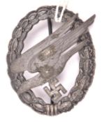 A Third Reich Luftwaffe Paratrooper’s badge, with Assmann mark on the back of the eagle and embossed