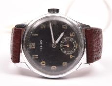 DH marked Helios wristwatch. Serial D 1616 H. Stainless steel case with polished finish, 33mm