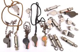 21 various whistles, mostly WWII military: 3 Air Ministry marked dinghy whistles; 7 “Metropolitan”