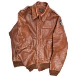 A modern copy of a US Army Air Force type A2 light brown leather flying jacket, with painted leather