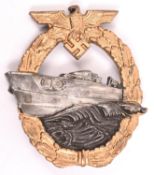 A Third Reich 1st type E Boat war badge, gilt, silvered and bronzed finish. VGC £70-100