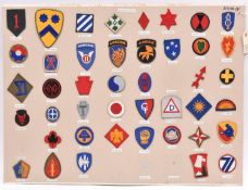 35 US Army Air Force and related cloth patches, mounted on a card; and 43 US Army Division patches