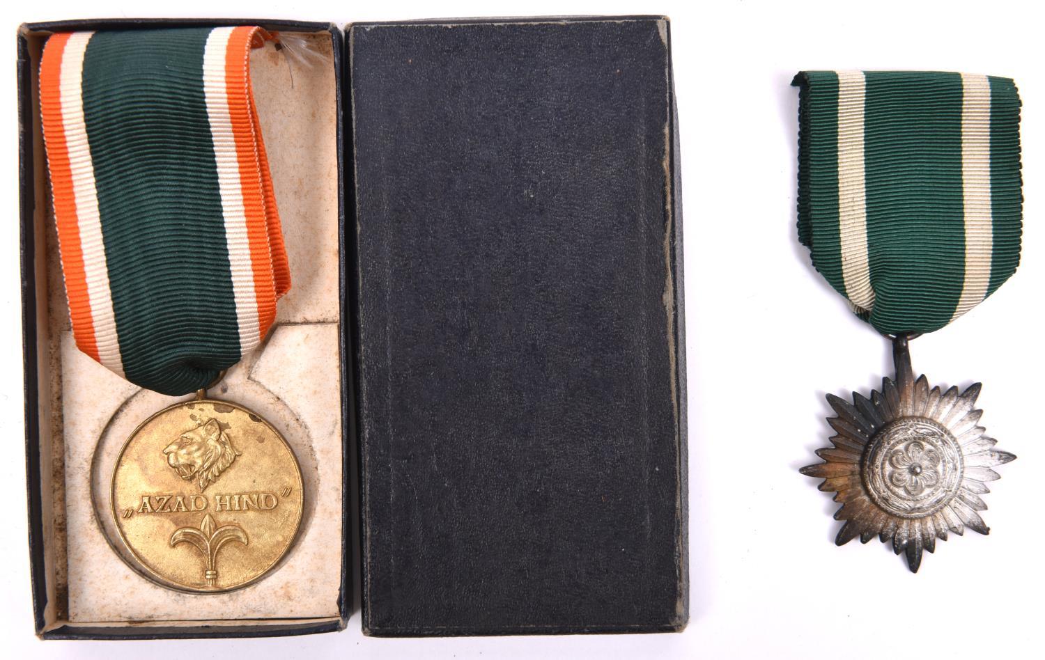 A Third Reich Azad Hind (Indian Nationalist Vols) medal, in its card case of issue; and a Ostvolk