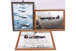 2 mirror prints of a Spitfire and Hurricane, with facsimile signatures of WWII pilots, 19” x 13”, in