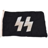 A Third Reich SS black flag, 55" x 33" with SS runes in centre. GC £120-150