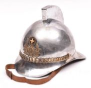 A Greek Police helmet, plated, crested skull, enamelled brass badge. GC £30-40